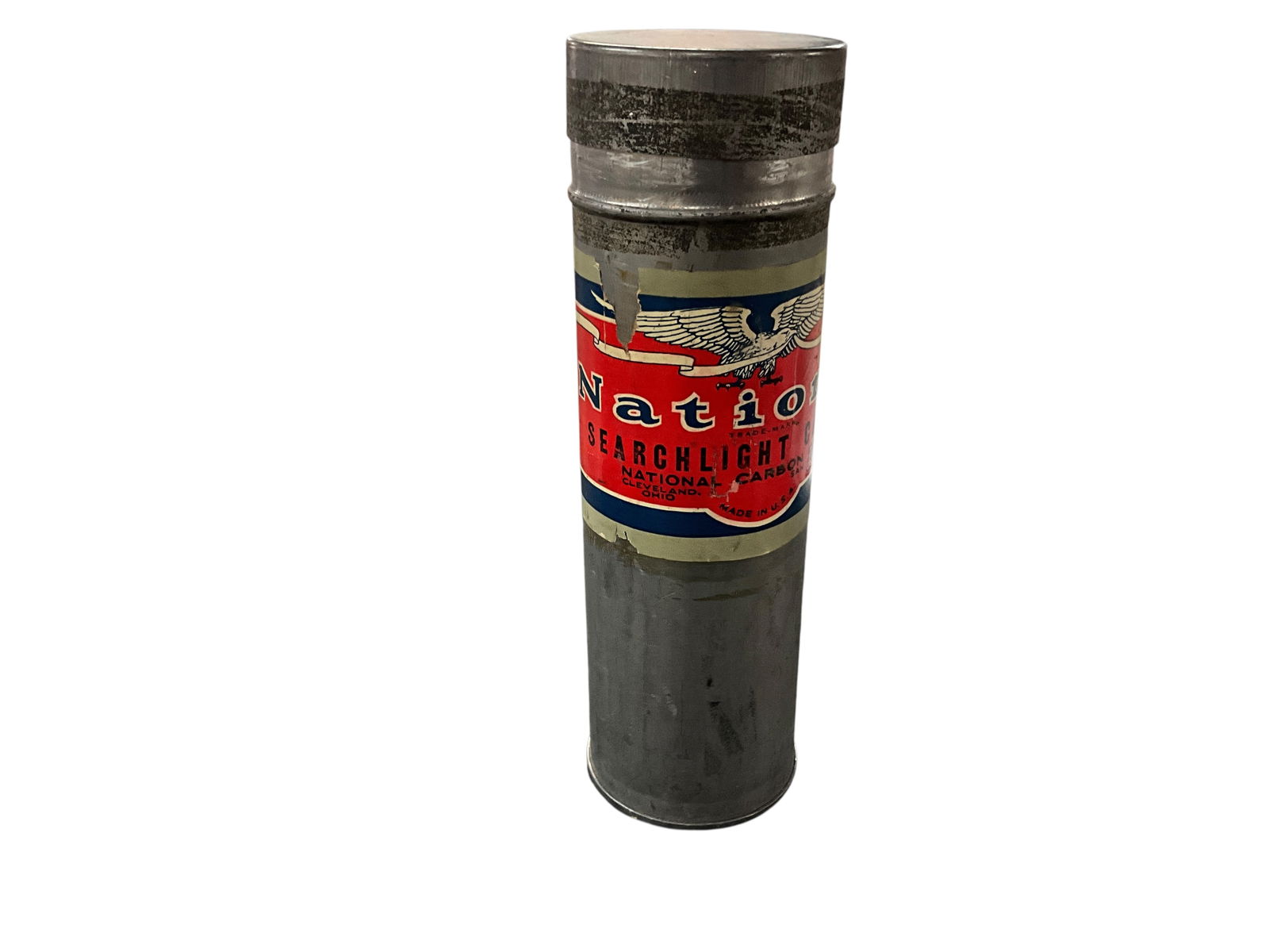 National Searchlight Carbons: National Searchlight Carbons. Steel canister with friction fit cap and nice old paper label. Contains 24 carbons, packed in sawdust.