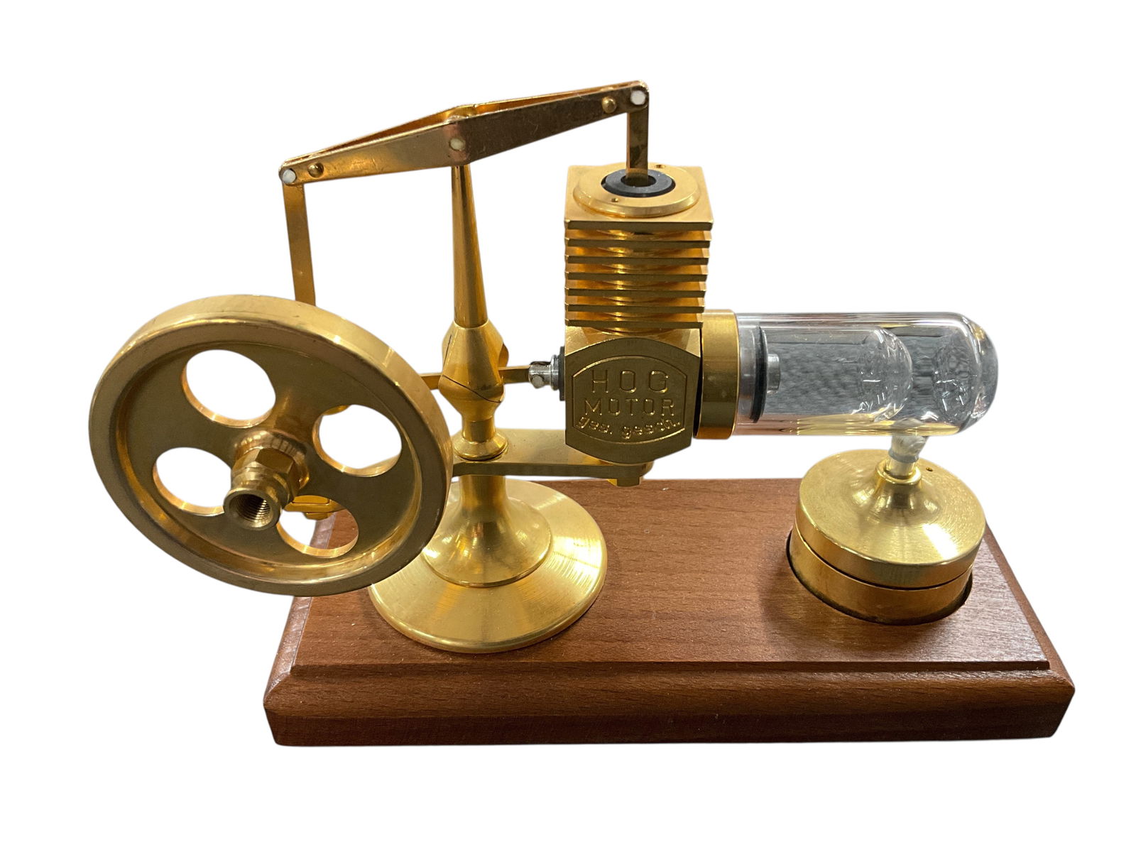 Desktop Model HOG Motor: Desktop Model HOG Motor. A miniature Stirling engine model of an external combustion engine, powered by a small alcohol lamp.