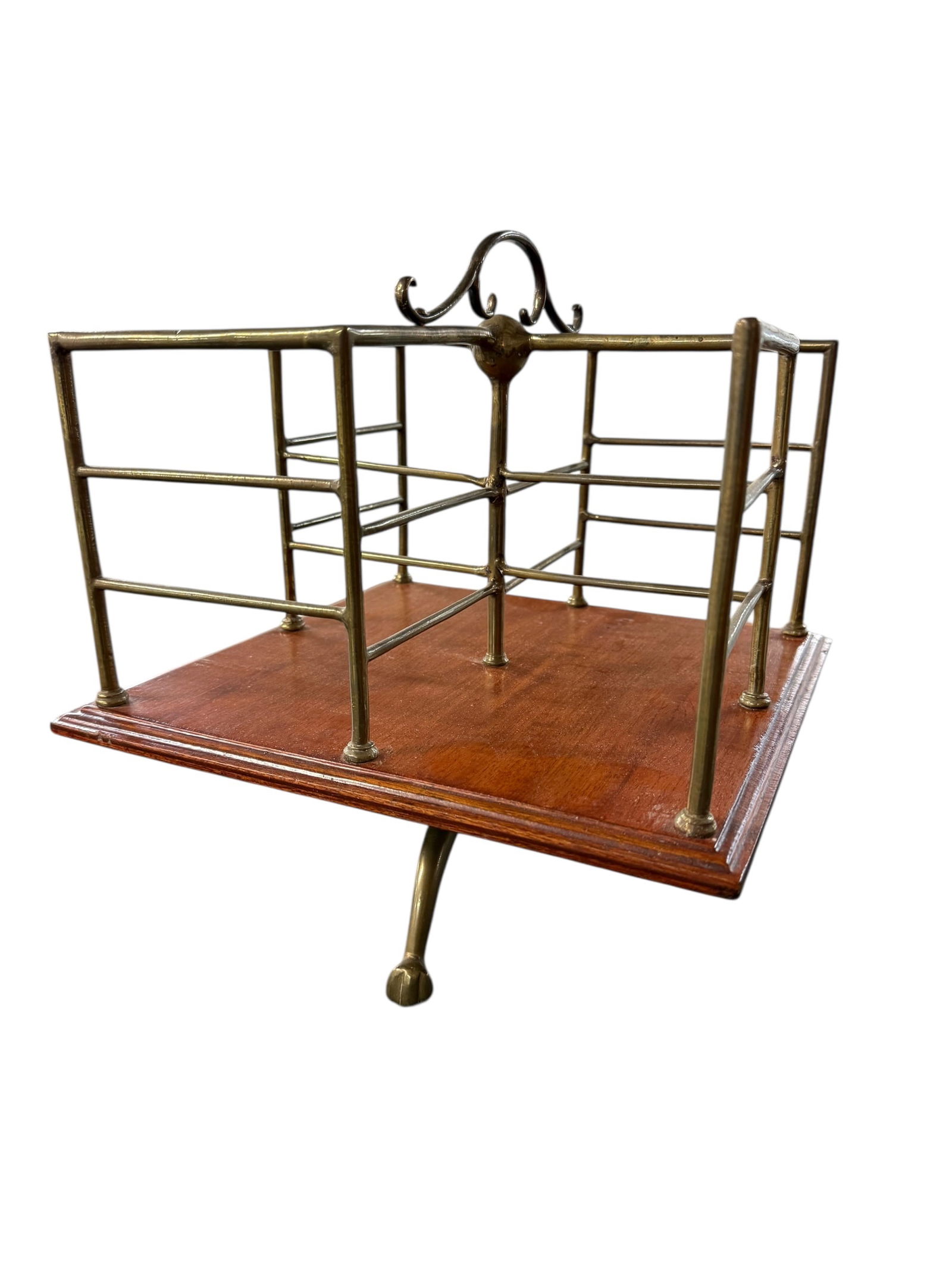 Rotary Tabletop Book Rack: Rotary Tabletop Book Rack. Mahogany platform with brass base & rails.