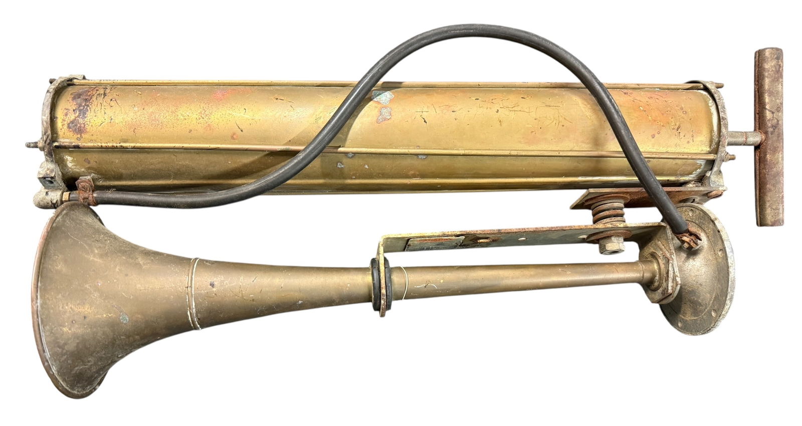 Faraday Mechanical Compression Air Horn: Faraday Mechanical Compression Air Horn. Horn with air cylinder that is manually pumped to force air through the horn. Tag reads, "Faraday Division, The Gray Manufacturing Co, Tecumseh, Michigan."