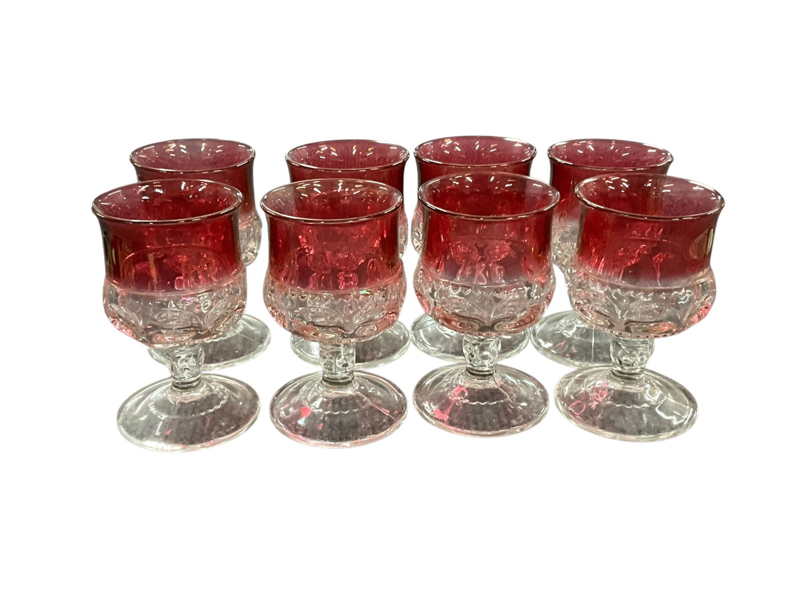 Set of Eight "King's Crown" Cordial/Aperitif Glasses: Set of Eight "King's Crown" Cordial/Aperitif Glasses, with "thumbprint" pattern, made by Tiffin Glass. Approx. 4.25" high.