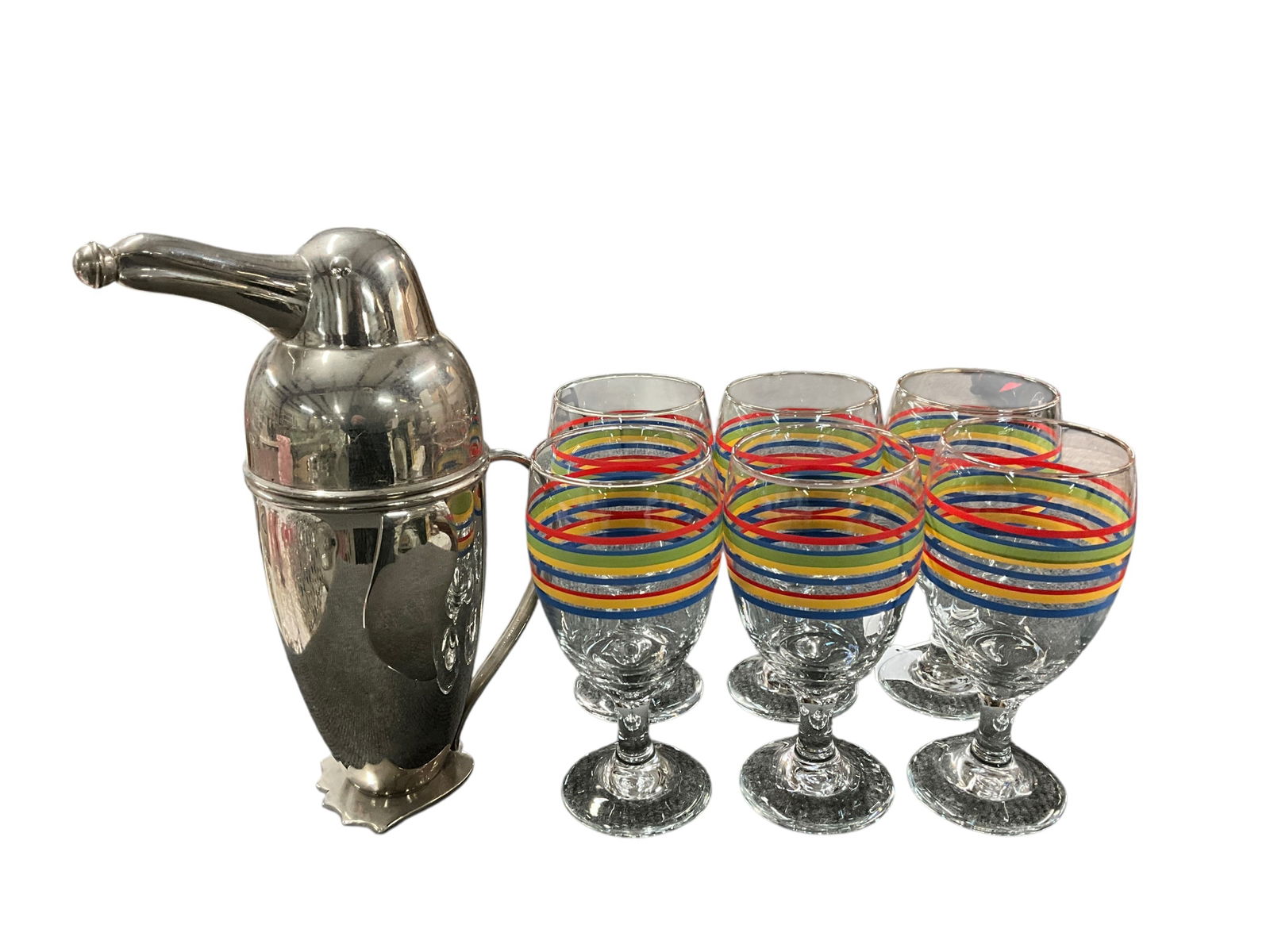 Set of Libbey Mambo Fiesta Goblets with Penguin Pitcher: Set of Libbey Mambo Fiesta Goblets with Penguin Pitcher. Set of six 7.5" goblets with a clever 12" drink shaker/pitcher in the shape of a penguin.