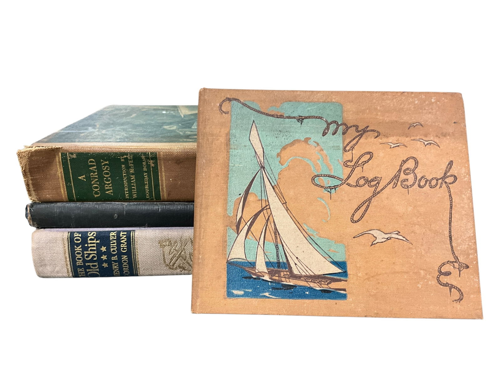 Book Lot- Nautical: Book Lot- Nautical. Four books: The Book of Old Ships, Piloting, Seamanship, and Small Boat Handling, A Conrad Argosy, and My Log Book (a 1926 scrapbook, intended to record an ocean voyage).