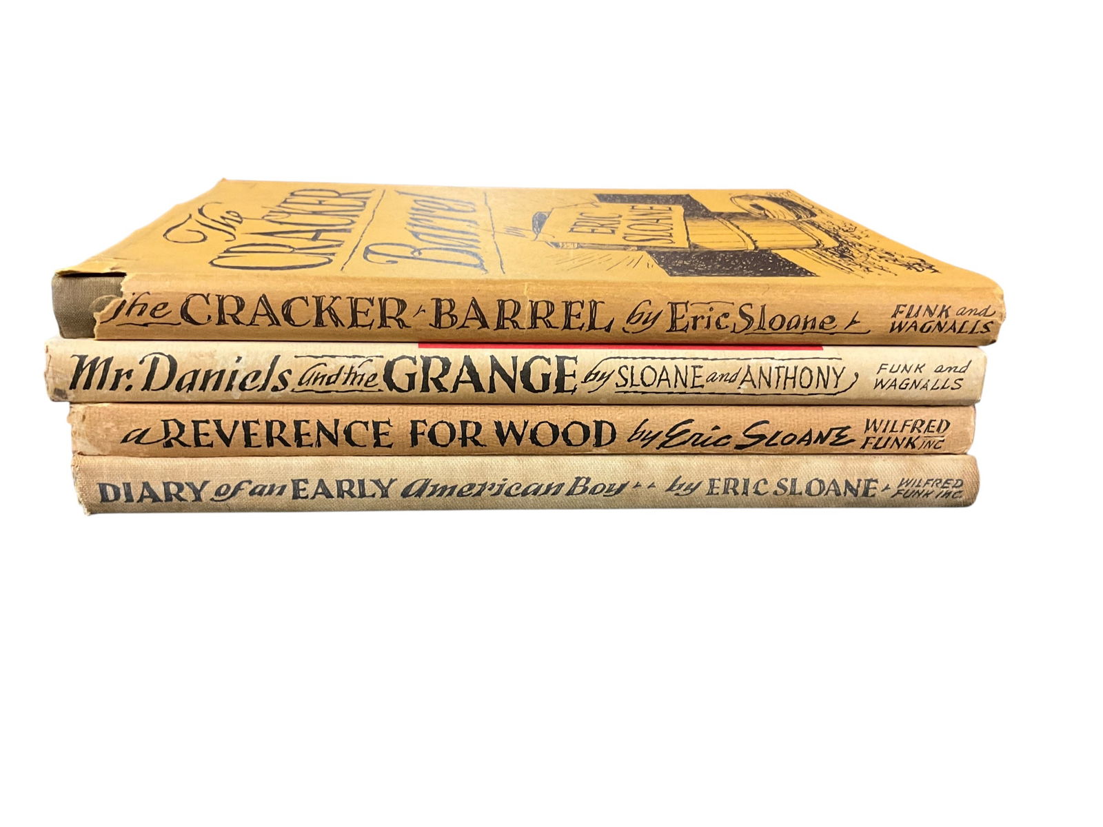 Book Lot- Eric Sloane Americana: Book Lot- Eric Sloane Americana. Four books: The Cracker Barrel, Mr Daniels and the Grange, A Reverence for Wood, and Diary of an Early American Boy.