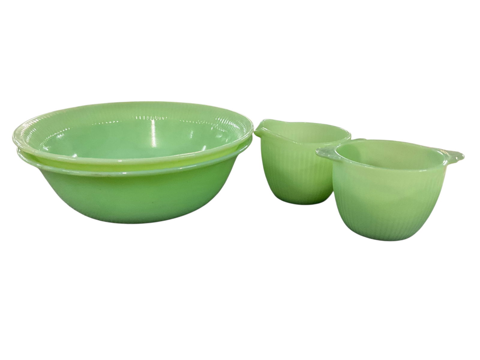 Fire King Jane Ray Pattern Lot: Fire King Jane Ray Pattern Lot. Two 8.25" serving bowls, and a cream & sugar.