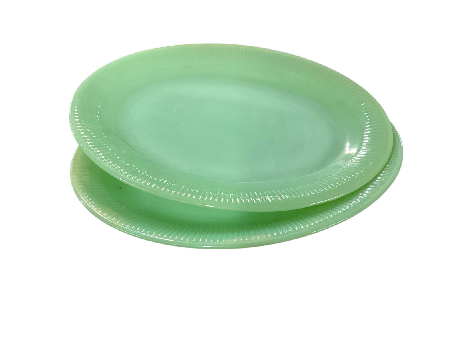 Fire King Jane Ray Pattern Platters: Fire King Jane Ray Pattern Platters. Two 12" X 9" platters- one has a small rim chip, and both have dishwasher hazing.