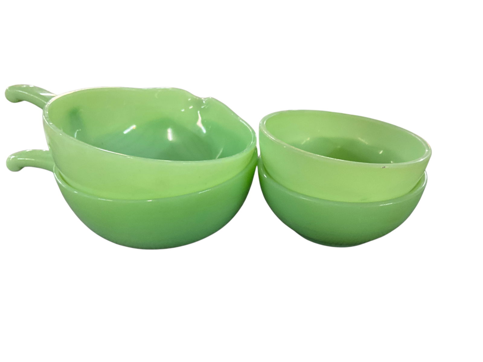 Fire King Lot: Fire King Lot- two 6.25" mixing bowls with spouts & handles, and two 5" bowls, which have some roughness to the rims, as well as dishwasher hazing.