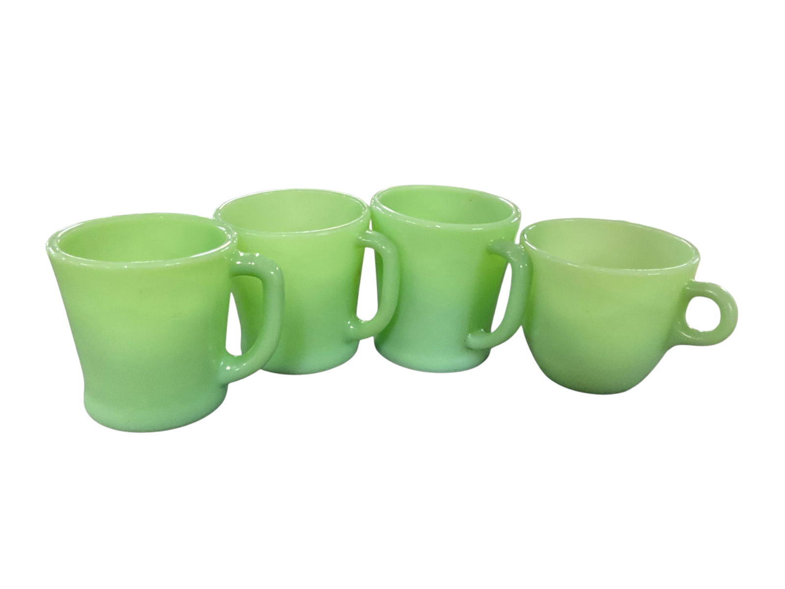 Fire King Lot: Fire King Lot. Four coffee mugs, in two styles and three sizes. See photos