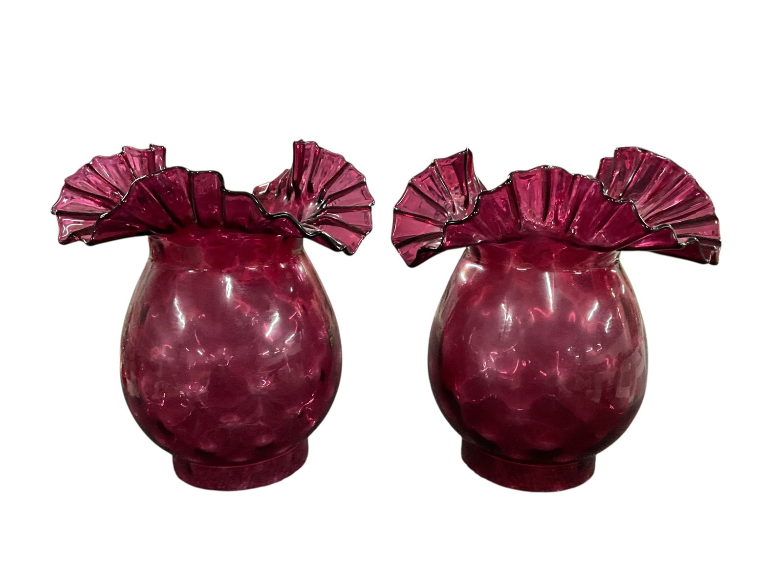 Pair of Fenton Cranberry Shades: Pair of Fenton Cranberry Shades. Ruffled edge shades with a subtle thumbnail pattern, approx. 9" high and 8" in diameter. With 4" fitters.