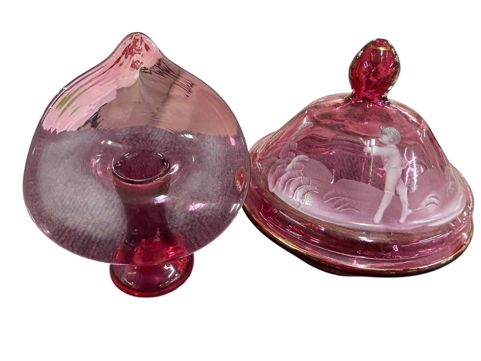 Cranberry Glass Lot: Cranberry Glass Lot. A Mary Gregory Covered dish, approx. 5" in diameter, and a 5.5" high Jack-in-the-Pulpit vase.