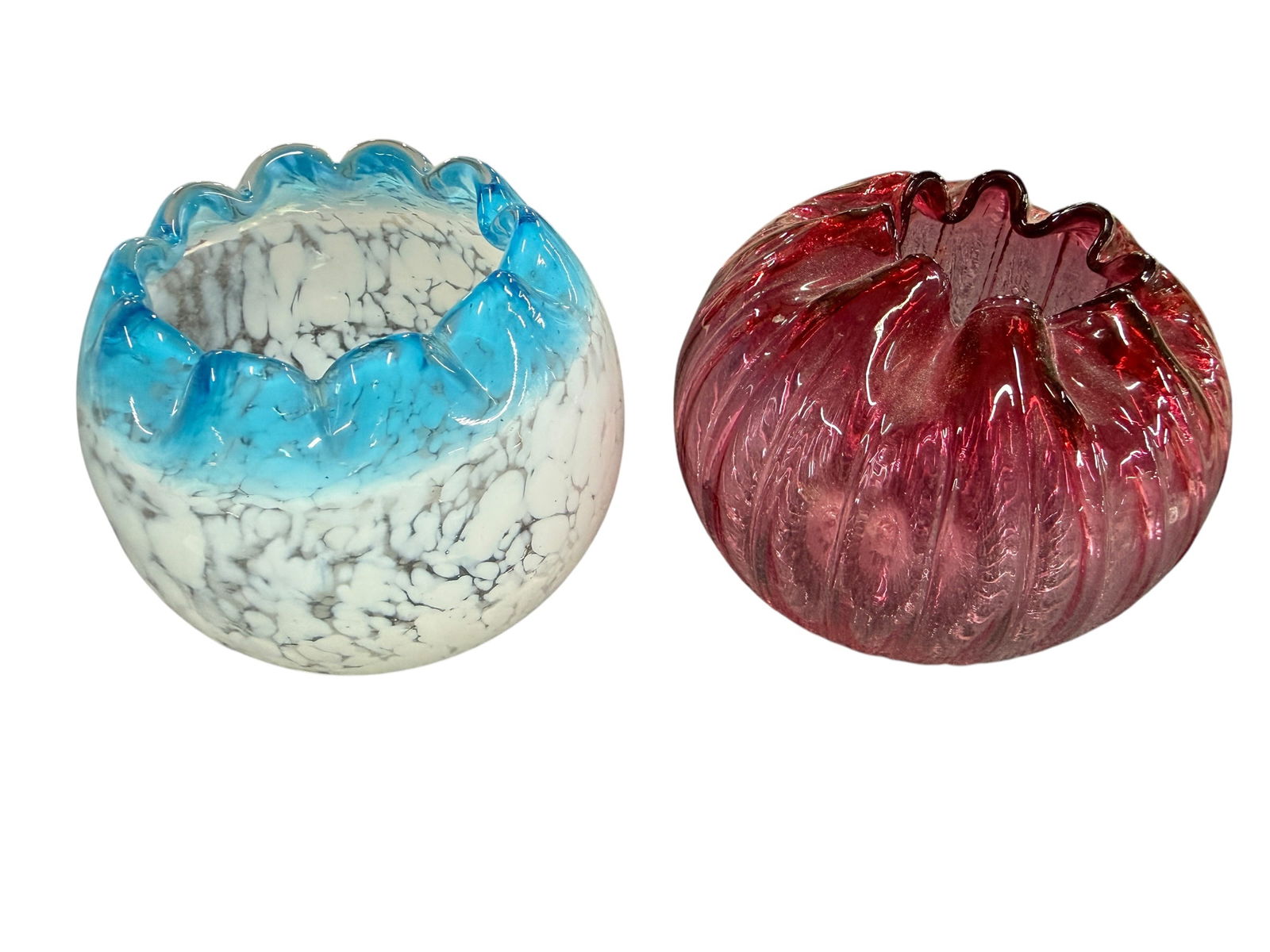 Fenton Rose Bowls: Fenton Rose Bowls- a blue and white opalescent, and a cranberry ribbed rose bowl. Each is approx. 4" high.