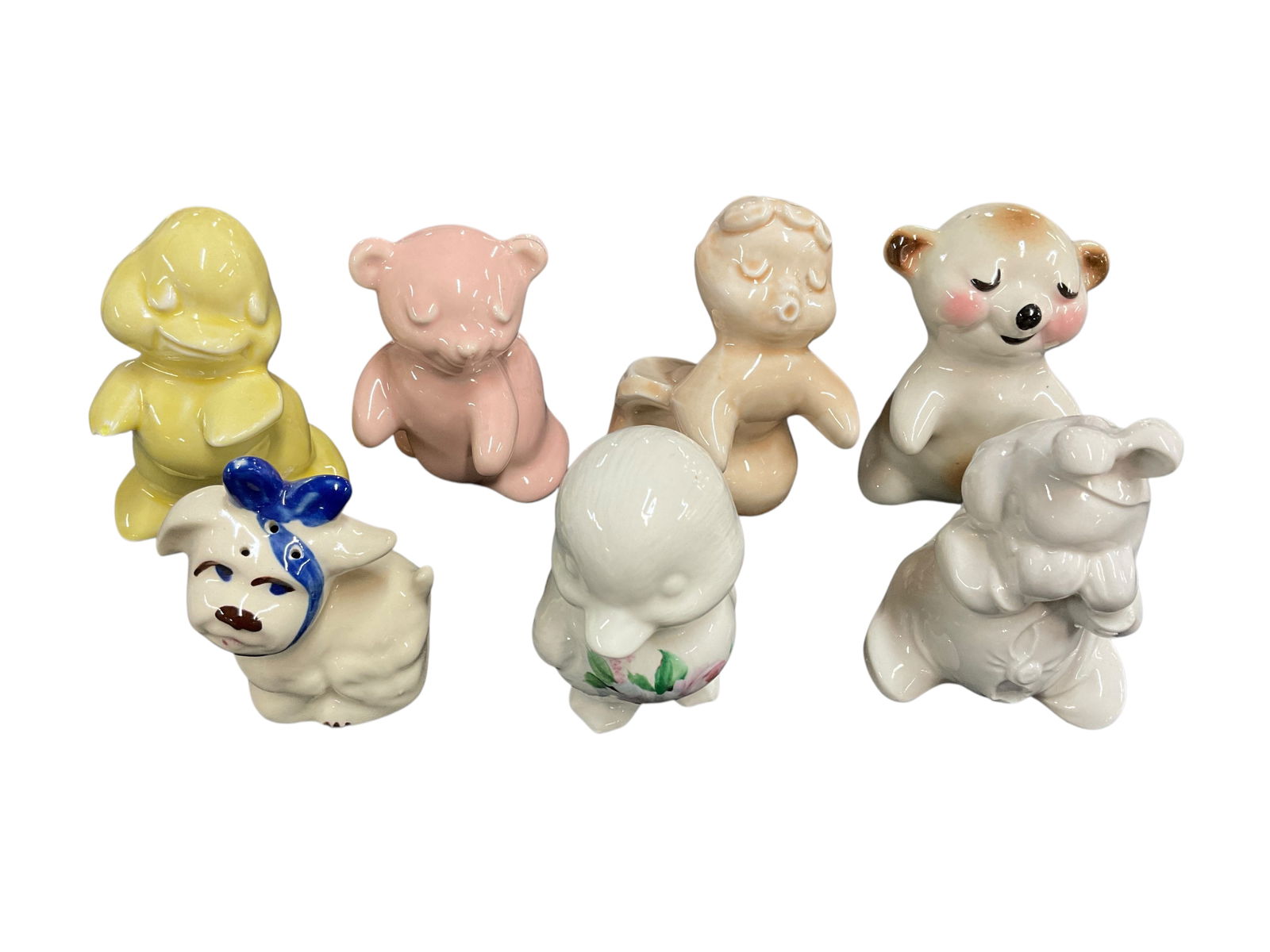 Lot of Seven Mismatched Van Tellingen "Huggies" S&P Shakers: Lot of Seven Mismatched Van Tellingen "Huggers" and other S&P Shakers. See Photos