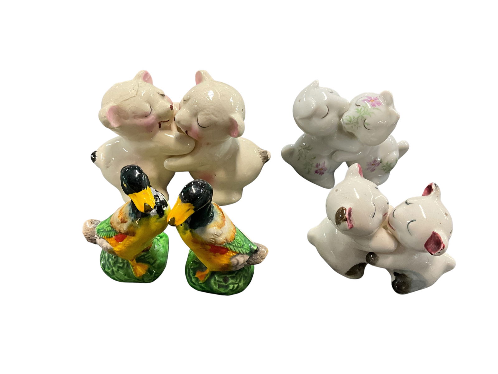 Vintage Salt & Pepper Shakers: Collection of four vintage, kitschy s&p shakers. Includes three sets of huggy by Van Telligen and a set of hand painted duck s&p shakers.