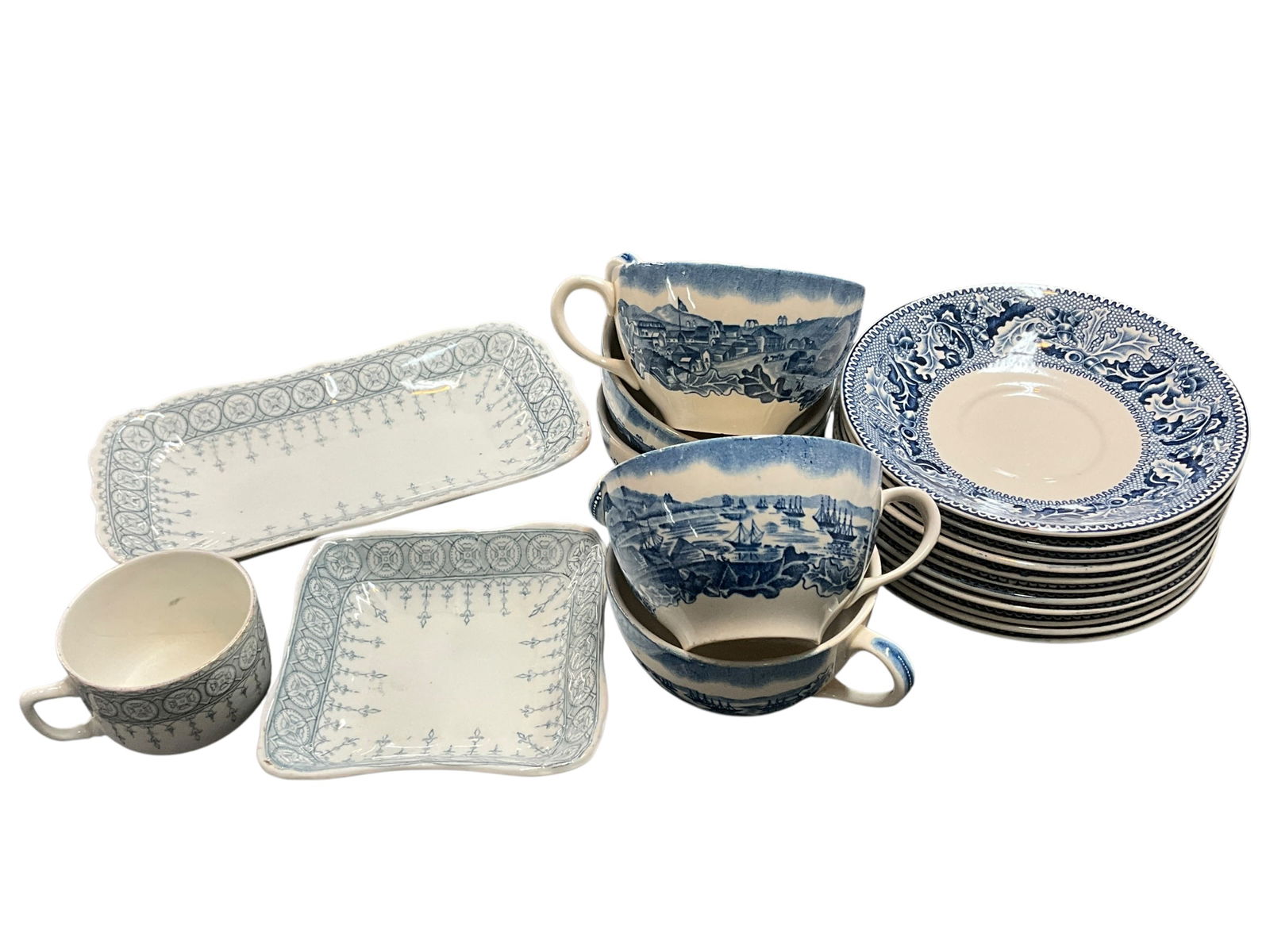 Collection of Blue Transferware: Three pieces of pale blue John Maddock and Sons Royal Vitreous china, cup has a significant crack. Johnson Brothers Historic America San Francisco Gold Rush, 5 tea cups and 10 saucers.