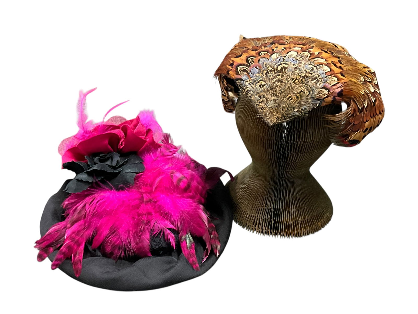Vintage Hats: A pair of vintage fun, feathered hats. A black, vintage silk hat adorned with dyed pink feathers and fabric flowers. A feathered skull cap from Marshall Field & Co.