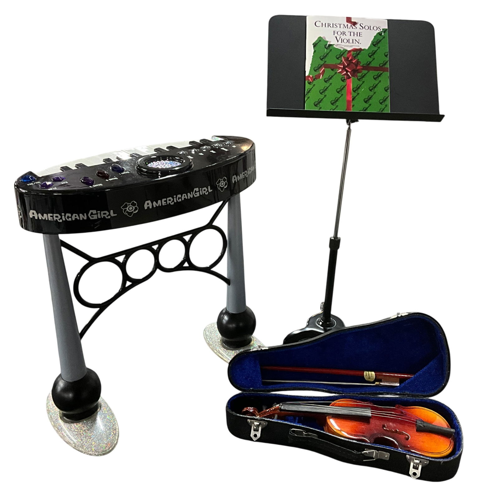 Vintage American Girl Doll Accessories: Violin Set that includes the stand, music, instrument and even the rosin for the bow. Also included in the lot is the Doll of Today Sparkle Keyboard (missing battery cover).