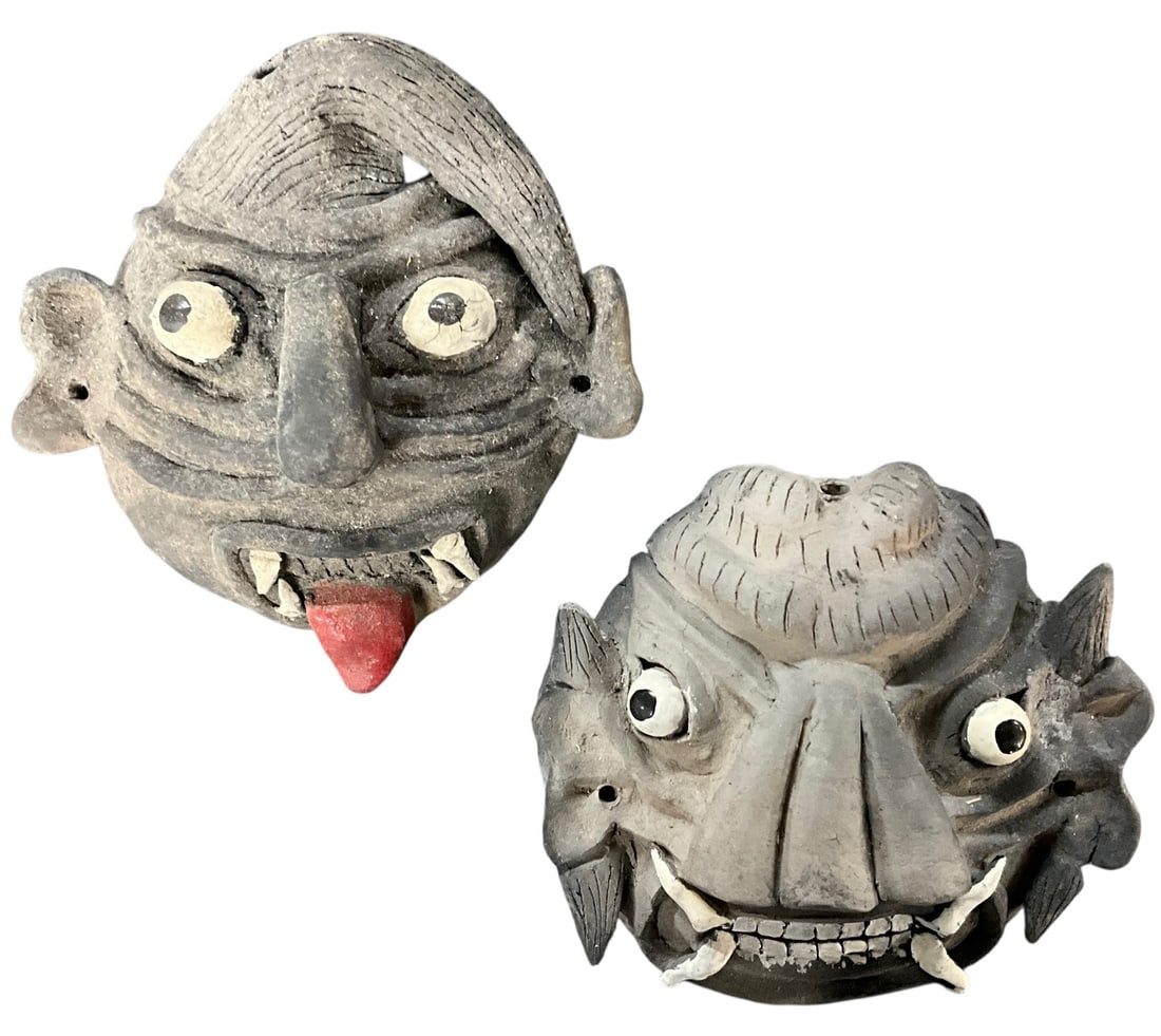 Two Ceramic Monster Masks, Southwestern China: Ceramic Monster Masks, Southwestern China. Two vividly sculpted and painted masks, measuring approx. 5" to 6" high. From the collection of the Kruizenga Art Museum at Hope College, Holland, MI.