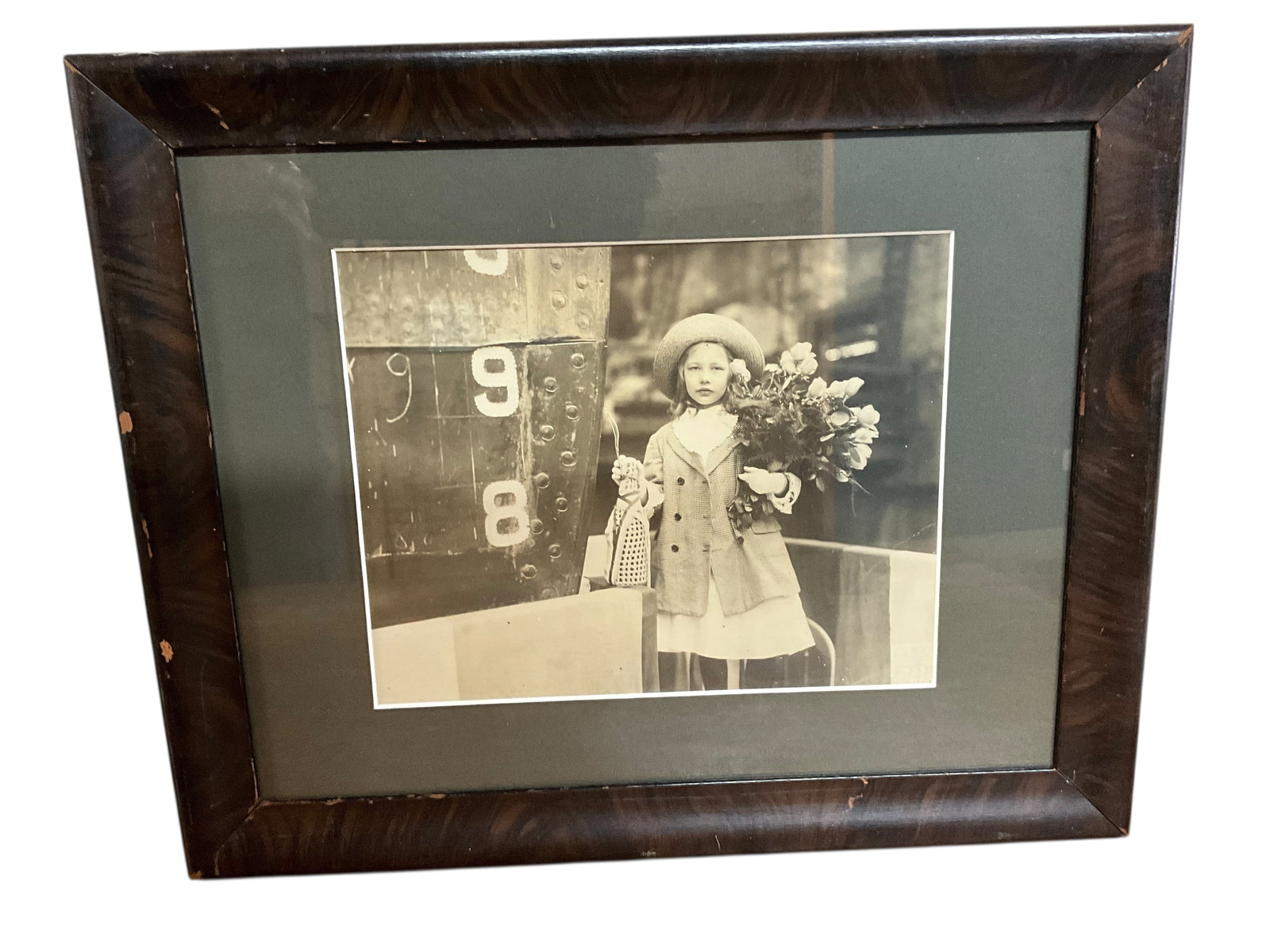 1943 Vintage Photo- A Ship Launching Lass: 1943 Vintage Photo- A Ship Launching Lass. Inscription on reverse states, "Mis Dorothy Bieber at the launching of the Tug Sonoma, 1943, New York Shipbuilding Co." Measures 13" X 16" OA, with an image