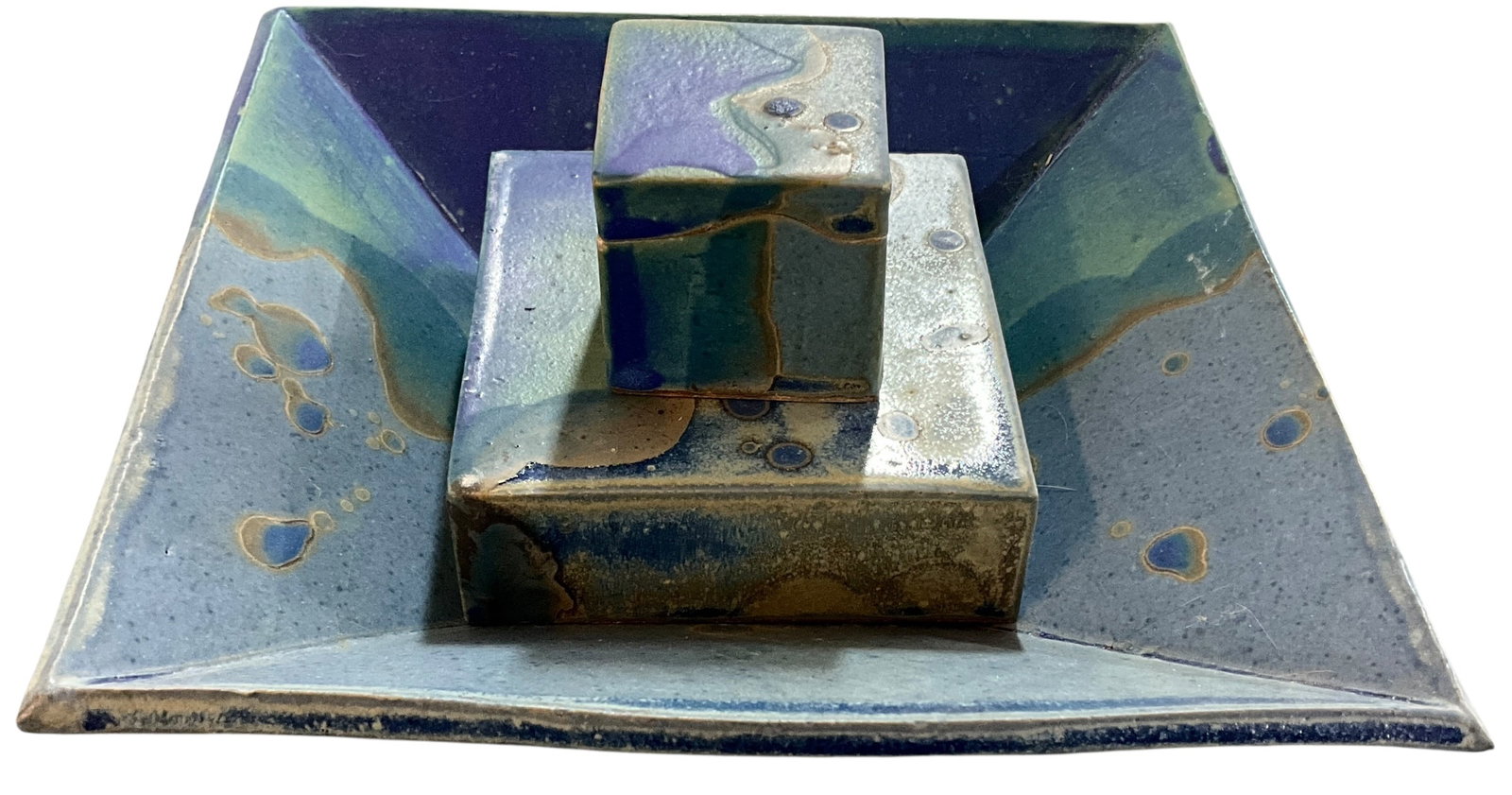 Trio of Companion Art Pottery Items by Evelyn LaMers: Trio of Companion Art Pottery Items by Evelyn LaMers- an 8.75" square footed bowl, 4" high, a 4" square box, and a 2" cube shaped box, all with an attractive mottled blue glaze. Evelyn LaMers is