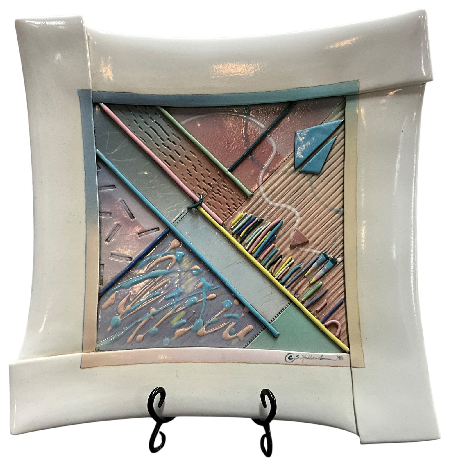 Signed 1988 Mixed Media Ceramic Wall Plaque - Abstract Geometric Design: Colorful abstract mixed media ceramic wall plaque featuring raised geometric elements and vibrant glaze work. Signed and dated S. Hubbard '88 in the lower corner. Mounted with wire on verso for easy