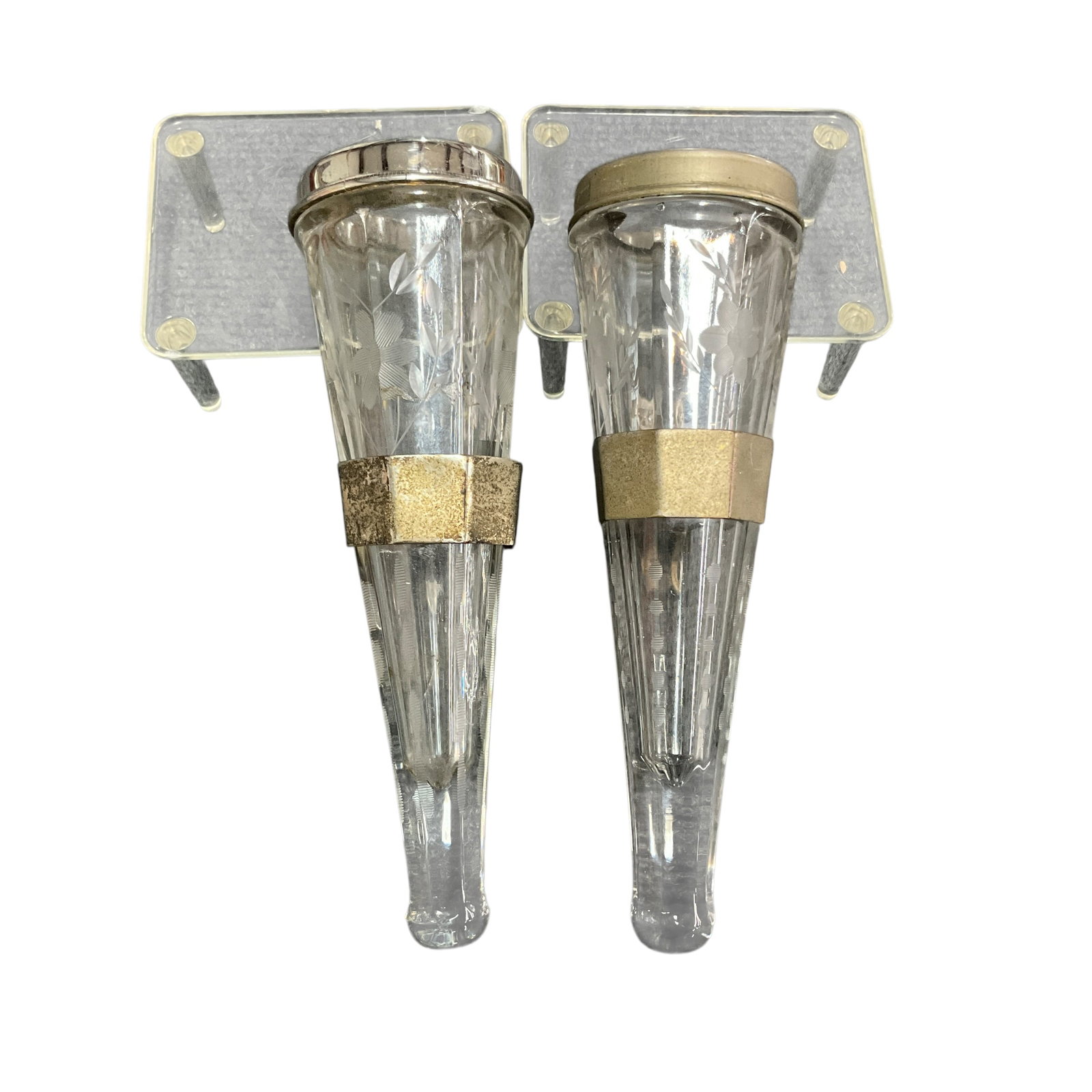 Pair of Antique Clear Glass Automotive Flower Vases: Pair of antique clear etched glass automotive flower vases with original mounts; floral etched design; one lid damaged; light wear.
