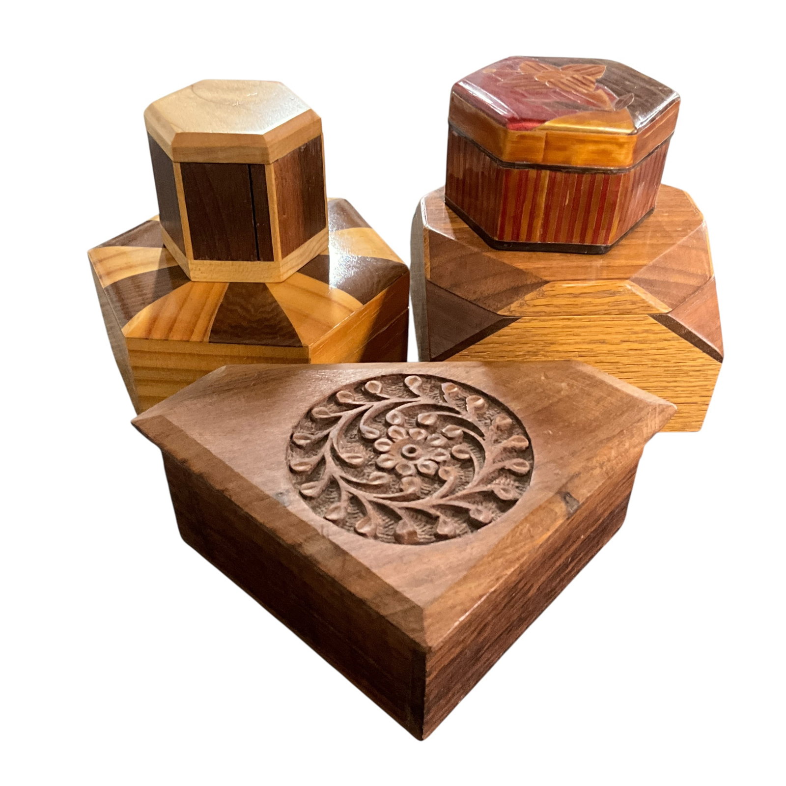 Collection of Inlaid and Carved Wooden Boxes: Collection featuring geometric inlay, carved motifs, and velvet-lined interiors.