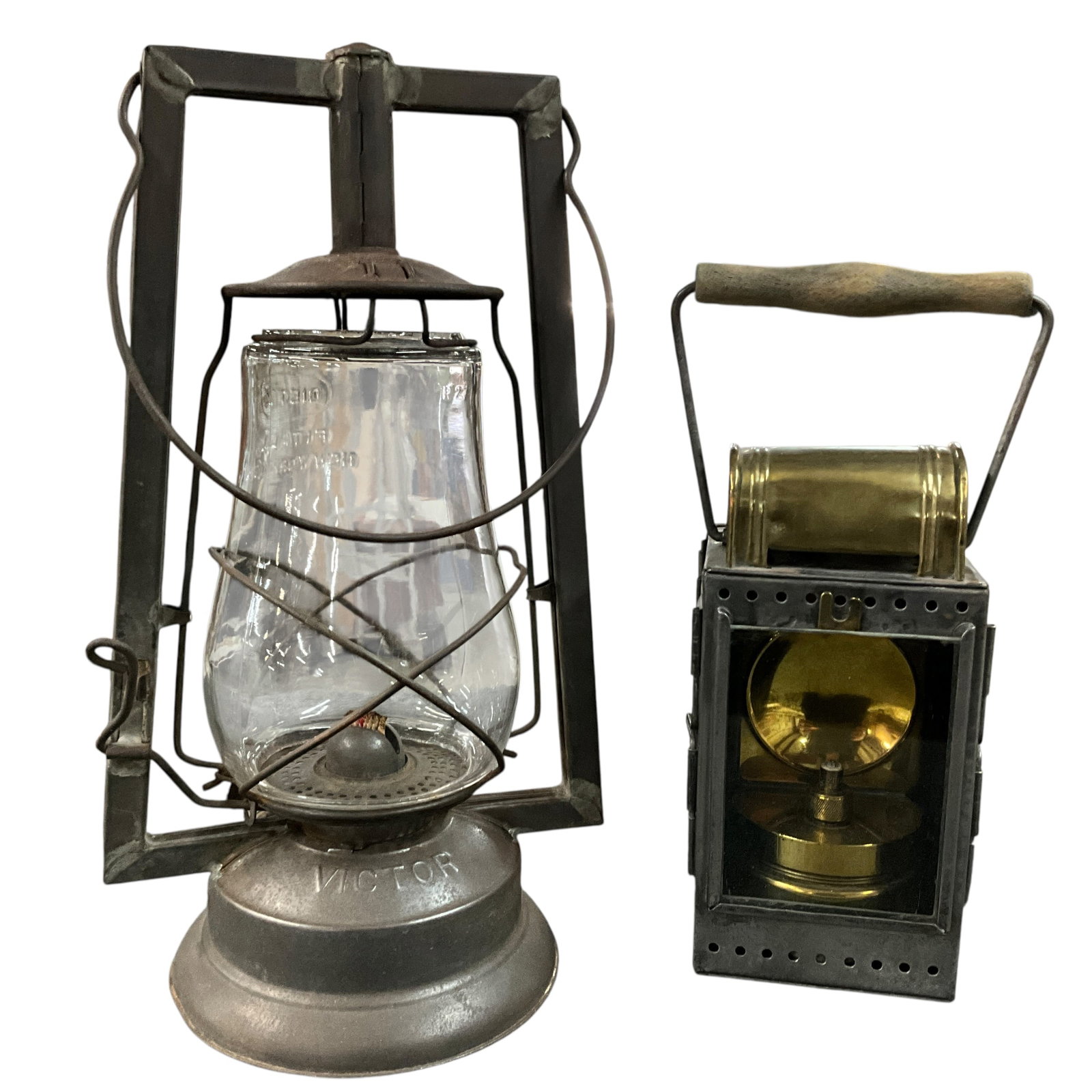 Antique Dietz Kerosene Lantern & Vintage Railroad Signal Lantern: Lot includes two vintage lanterns. The first is a classic kerosene lantern marked “Dietz,” featuring a clear glass globe, wire guard, and square protective frame. The second is a railroad-styl