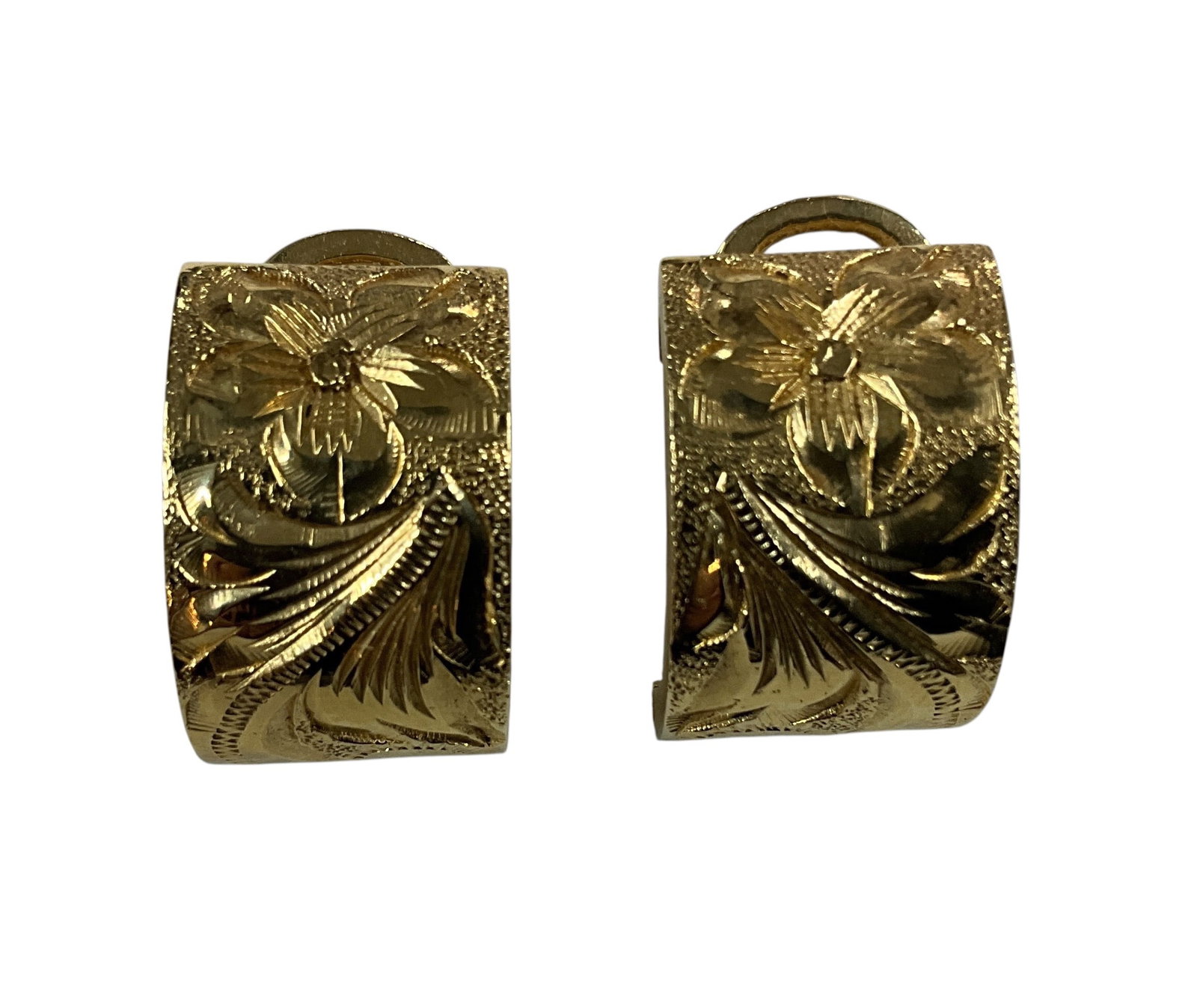Pair of 14K Gold Engraved Floral Hoop Earrings: Elegant pair of 14K gold hoop earrings featuring finely engraved floral and scrollwork designs across a curved rectangular form. The earrings exhibit detailed texturing and dimensional patterning, giv