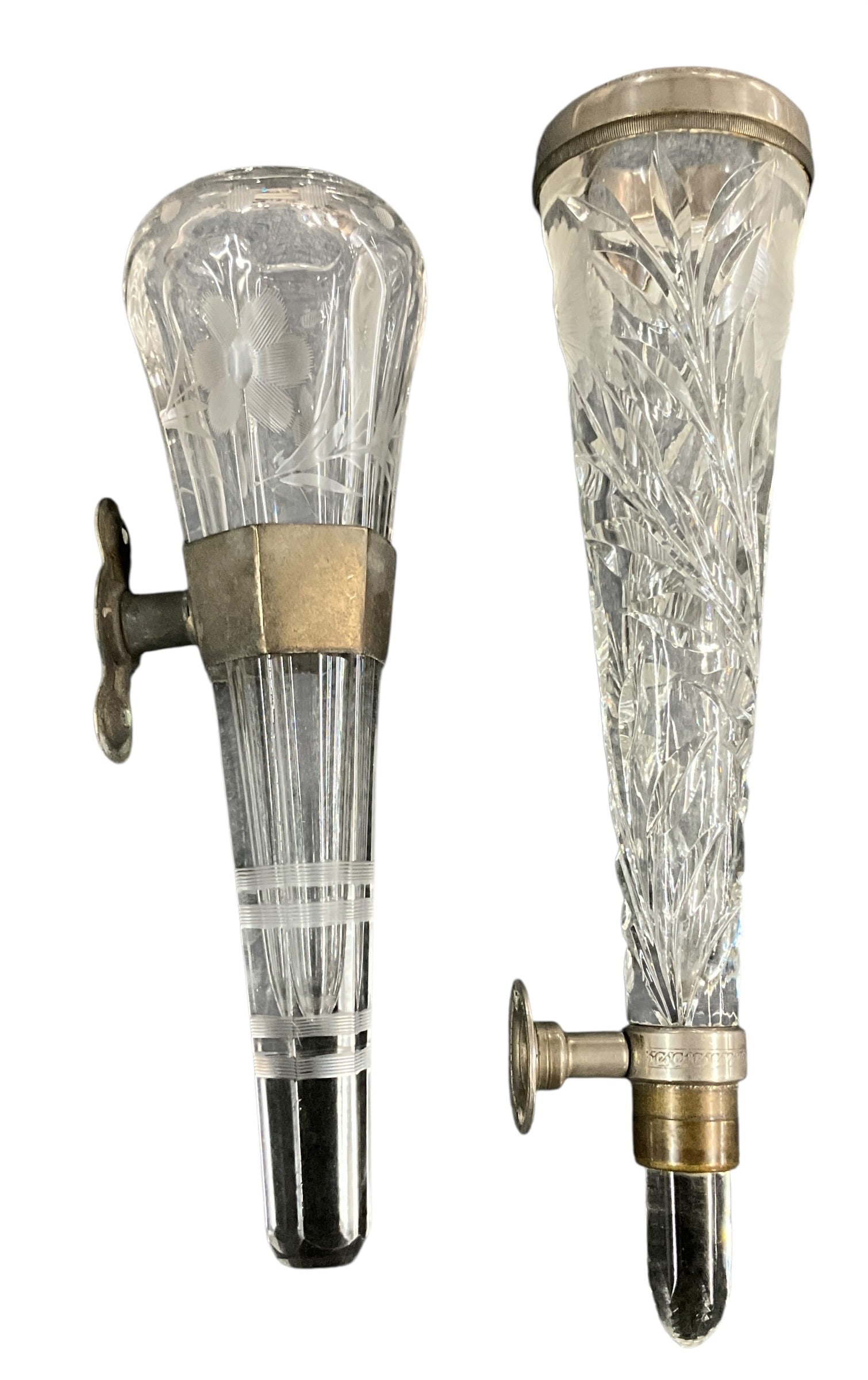 Pair of Antique Cut Glass Automobile Flower Bud Vases with Metal Mounts: Offered here is a desirable pair of antique automobile bud vases, dating to the early 20th century, featuring finely cut and etched glass bodies mounted in original metal brackets for interior vehicle