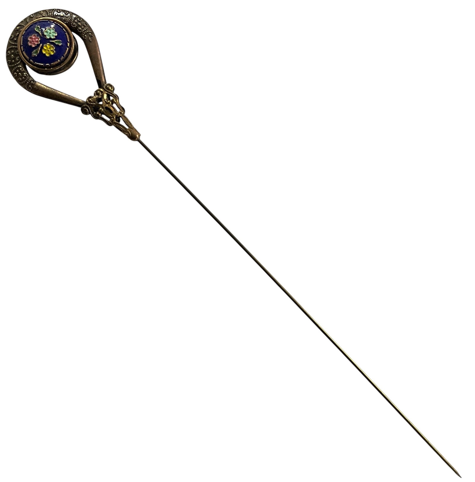 Antique Enameled Floral Hat Pin with Cobalt Blue Glass Center: Antique hatpin featuring an ornate gold-tone metal frame with a circular enameled floral design set against a deep cobalt blue glass ground. The central medallion displays raised multicolor enamel flo