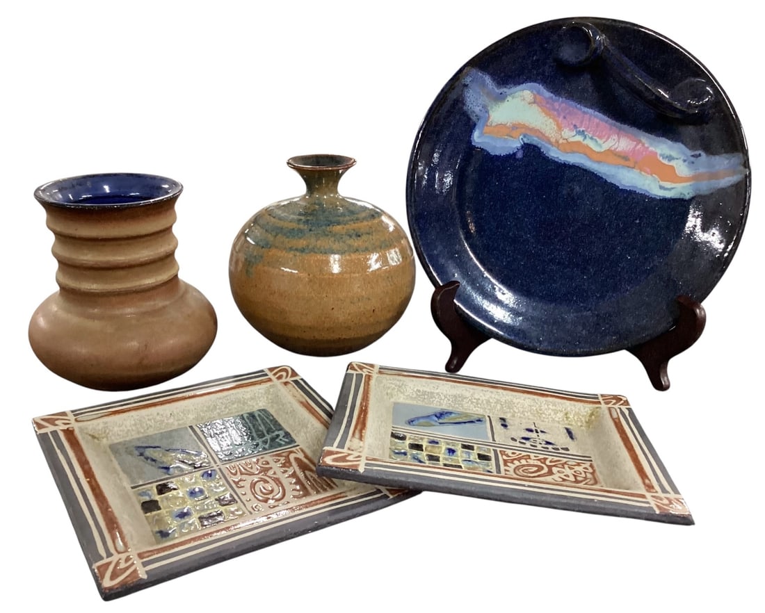 Six-Piece Studio Pottery Group Including Platter, Two Vases, and Two Decorative Trays: A six-piece grouping of studio pottery showcasing a variety of forms and glaze techniques. Includes a large round handled platter with deep cobalt blue glaze and a flowing abstract band of multicolor 