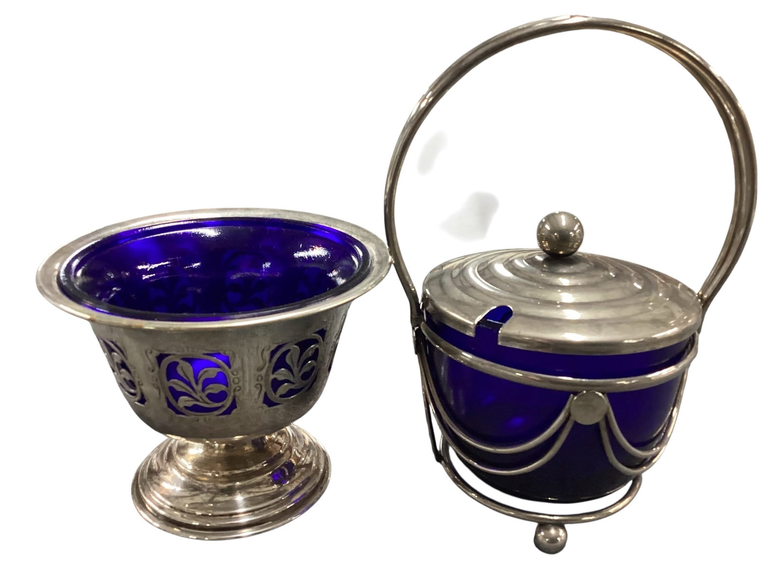 Collection of Cobalt Blue Glass and Silverplate Tableware: Lovely EPNS footed bowl with cobalt liner. Silver plate Art deco condiment pot with lid and cobalt liner