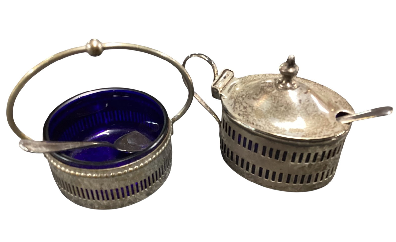 Sterling Silver Mustard Pot and Open Salt Cellar with Cobalt Blue Glass Liners: Vintage sterling silver condiment set including a covered mustard pot and matching open salt cellar, both retaining cobalt blue glass liners. The mustard pot features a hinged domed lid with spoon not