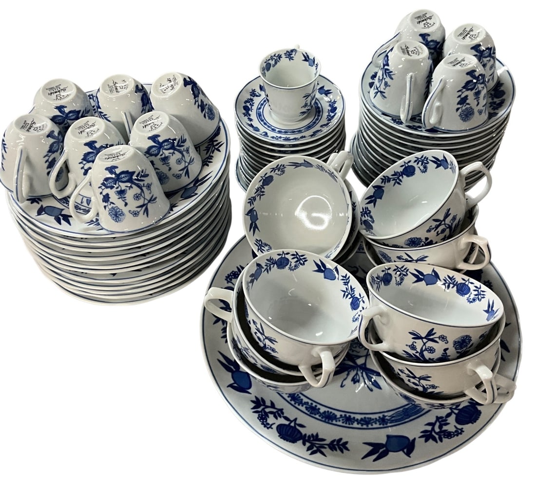 Schmidt Porcelain Blue & White Dessert Service: Matching Schmidt porcelain dessert service from Brazil in the same pattern as Lot 400. Includes 11 dessert plates, 12 coffee cups and saucers, 12 demitasse cups and saucers, and a serving platter.