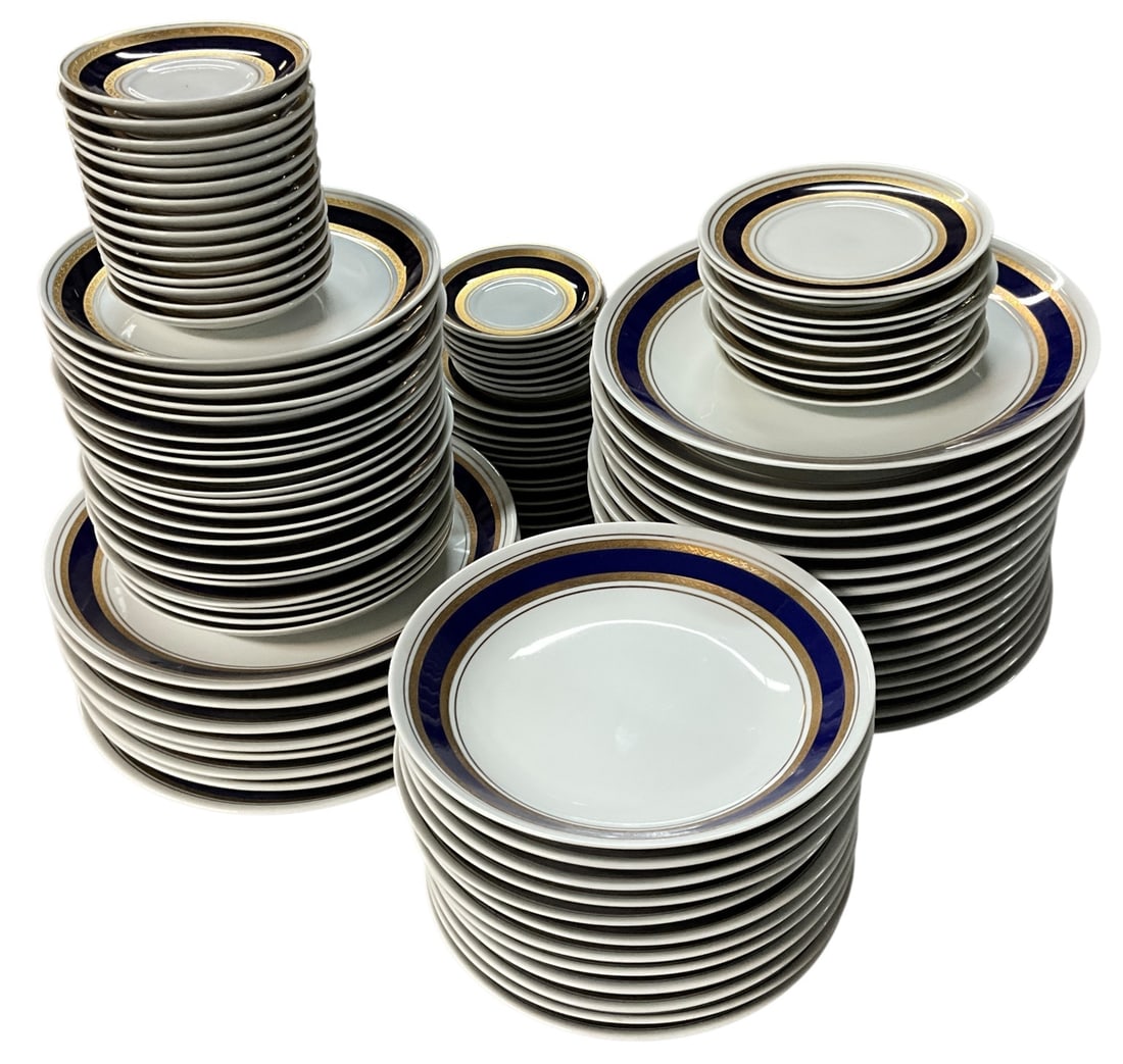 Porcelana Real Brasil Cobalt & Gold Porcelain Dinner Service: Extensive Porcelana Real porcelain dinner service from Brazil featuring cobalt blue and gold decoration. Includes 24 dinner plates, 21 dessert or salad plates, 12 soup bowls, 24 bread plates, and 23 s