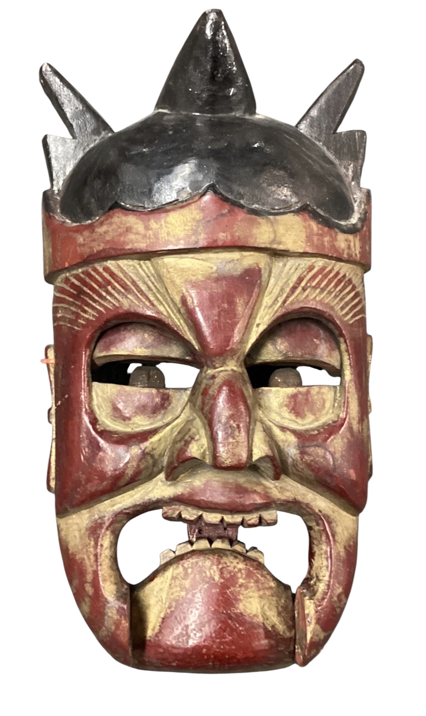Articulated Carved Wooden Devil / Demon Mask: Hand-carved and painted wooden devil or demon mask featuring articulated moving eyes and jaw mechanism. Carved with angular facial features, pointed crown or horn elements, and red, black, and gilt pa