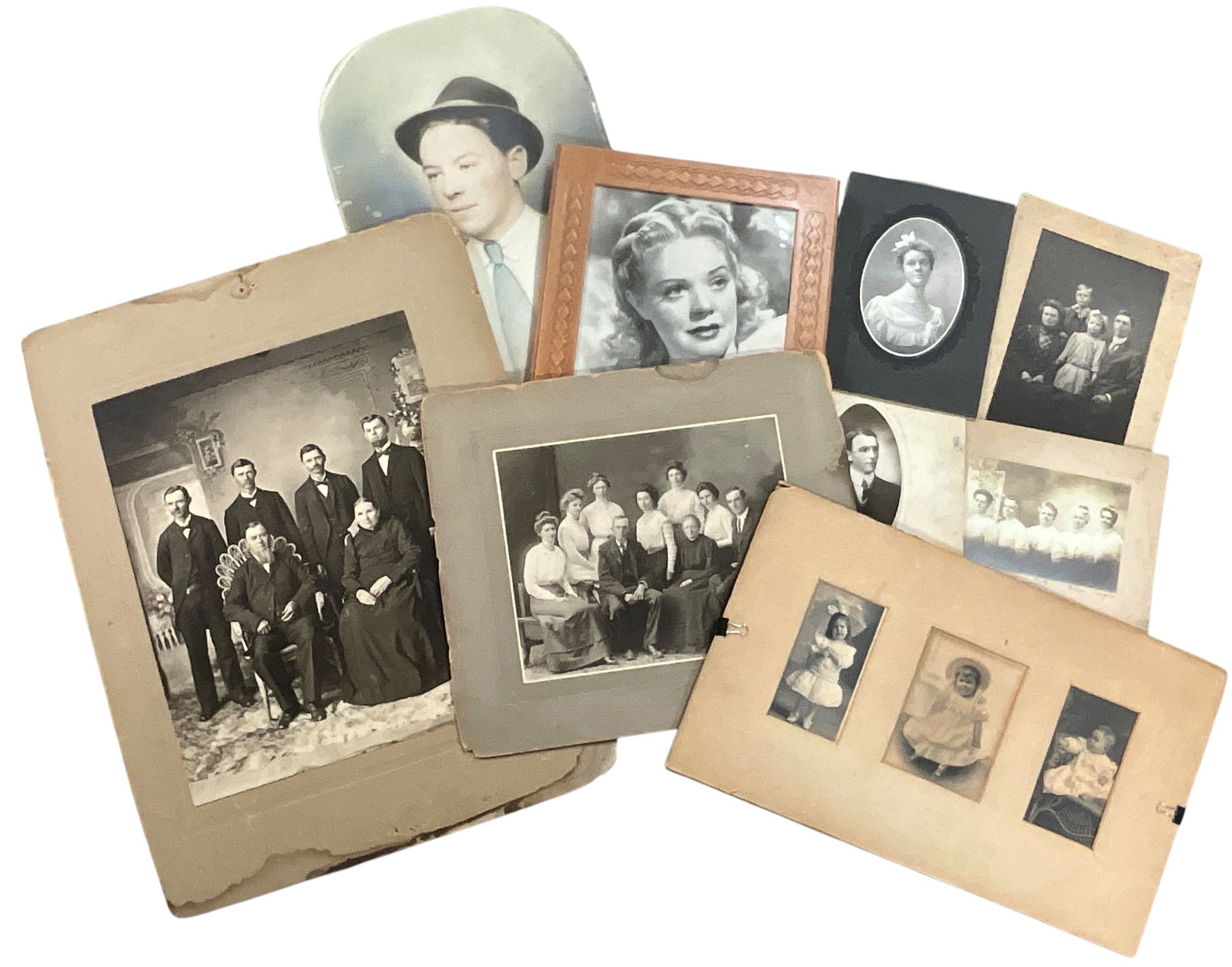 Collection of Antique Portrait Photographs & Cabinet Cards: Group of antique and early 20th century portrait photographs including cabinet cards, studio portraits, family photographs, childrenâ€™s portraits, and framed photographic mounts. Includes Vic