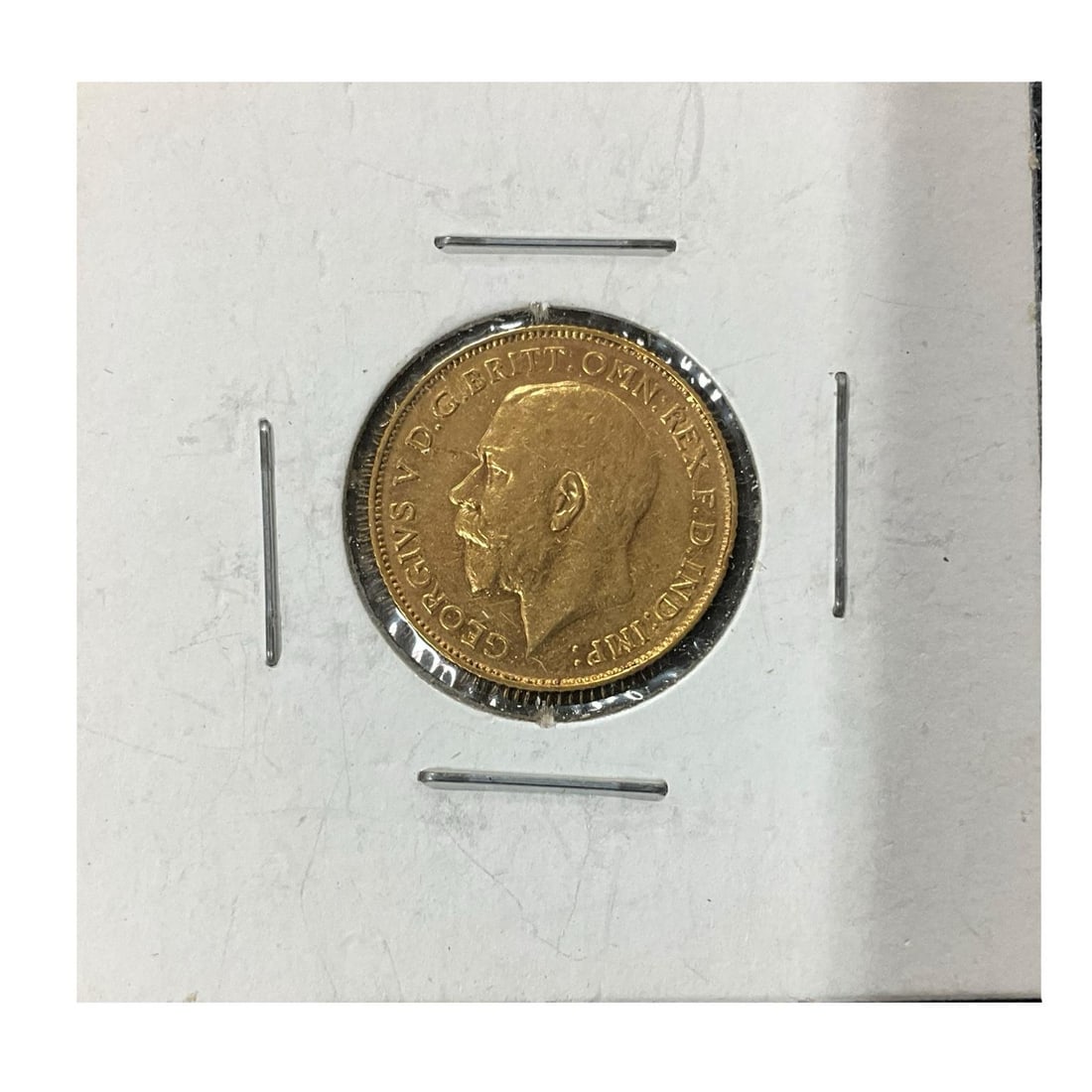 1911 British Gold Sovereign: 1911 British Gold Sovereign featuring King George V portrait and St. George slaying the dragon reverse.