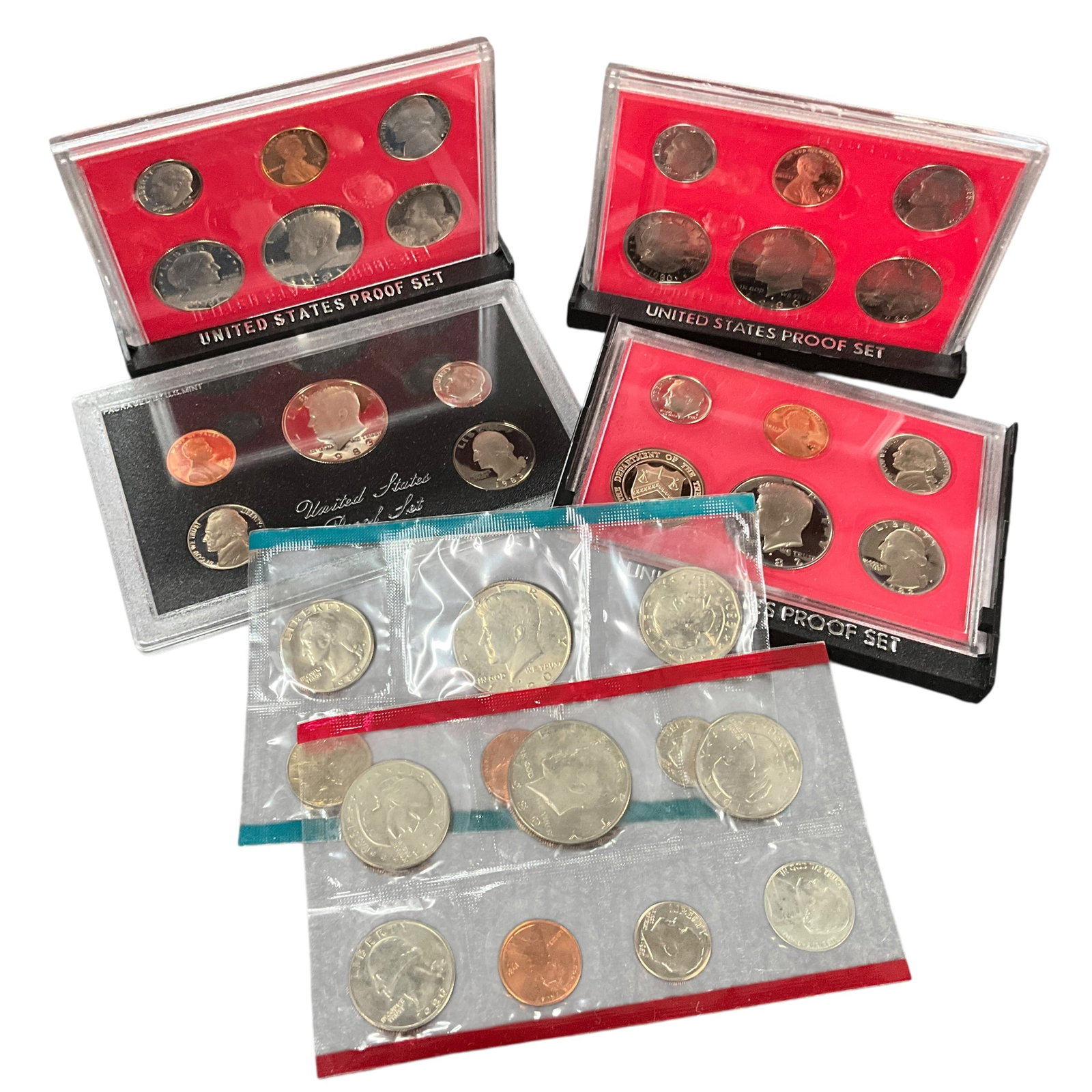 Collection of 1980-1983 United States Proof Sets: Lot includes four United States Proof Sets dated 1980, 1981, 1982, and 1983. Sets are housed in original U.S. Mint packaging including hard plastic display cases and original outer sleeves. Coins disp