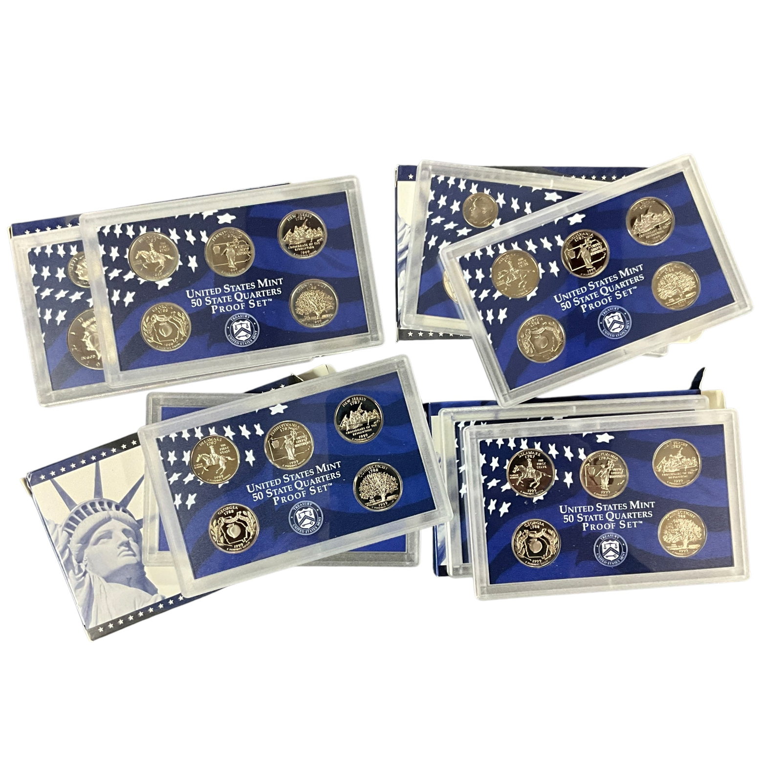 1999 United States Mint State Quarters Proof Set Group: Group of four 1999 United States Mint State Quarters Proof Sets in original government packaging. Each set includes the inaugural 50 State Quarters proof issues featuring Delaware, Pennsylvania, New J