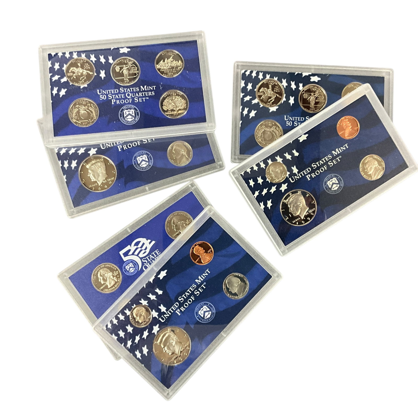 1999 United States Mint Proof Set Group: Group of three 1999 United States Mint Proof Sets in original government packaging and display cases. Includes standard proof coinage along with the inaugural 50 State Quarters issues.