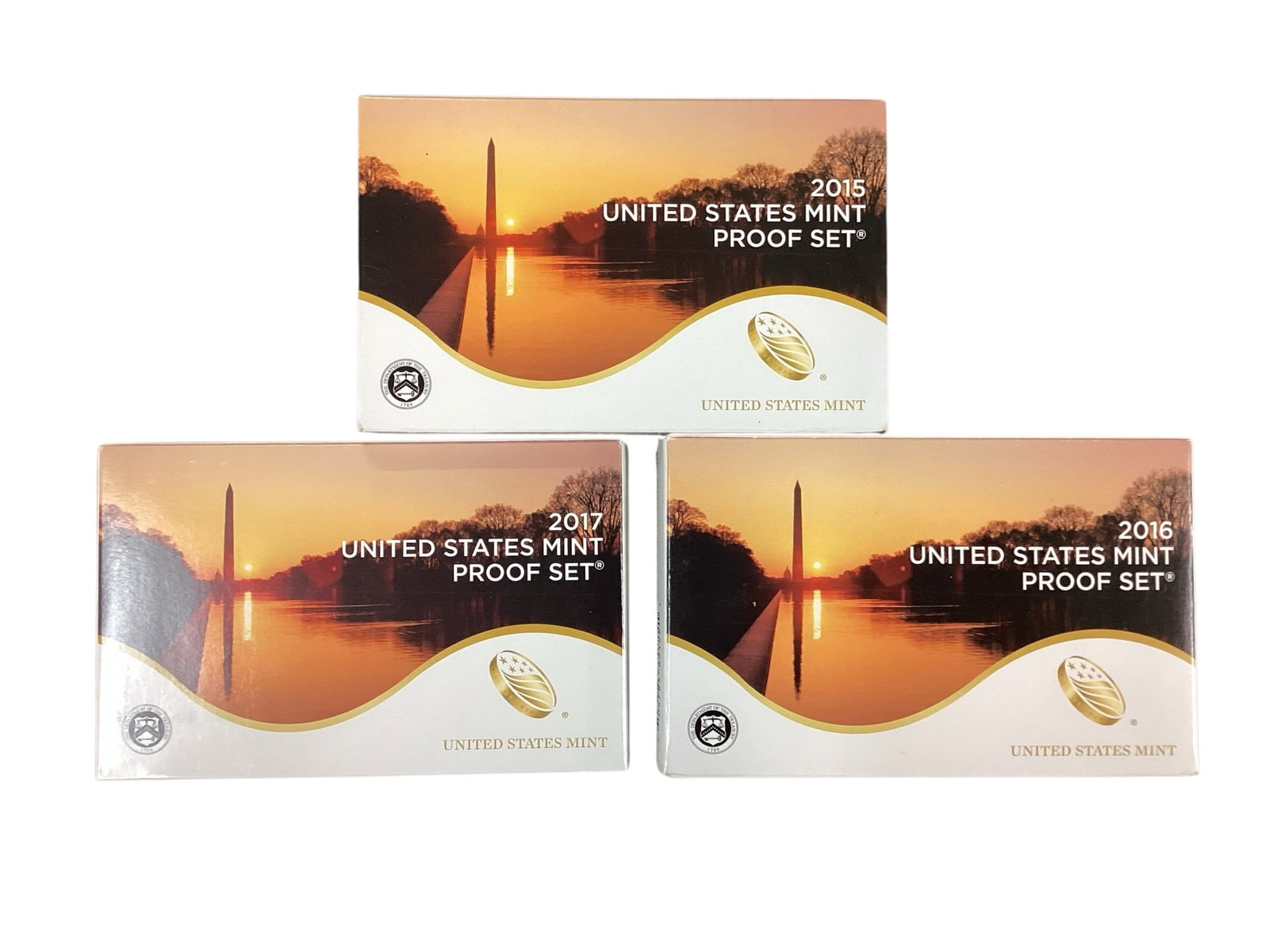 Three United States Mint Proof Sets, 2015-2017: Collection of three official United States Mint Proof Sets including 2015, 2016, and 2017 issues in original government packaging with protective mint cases. Sets feature Presidential $1 proof coins i
