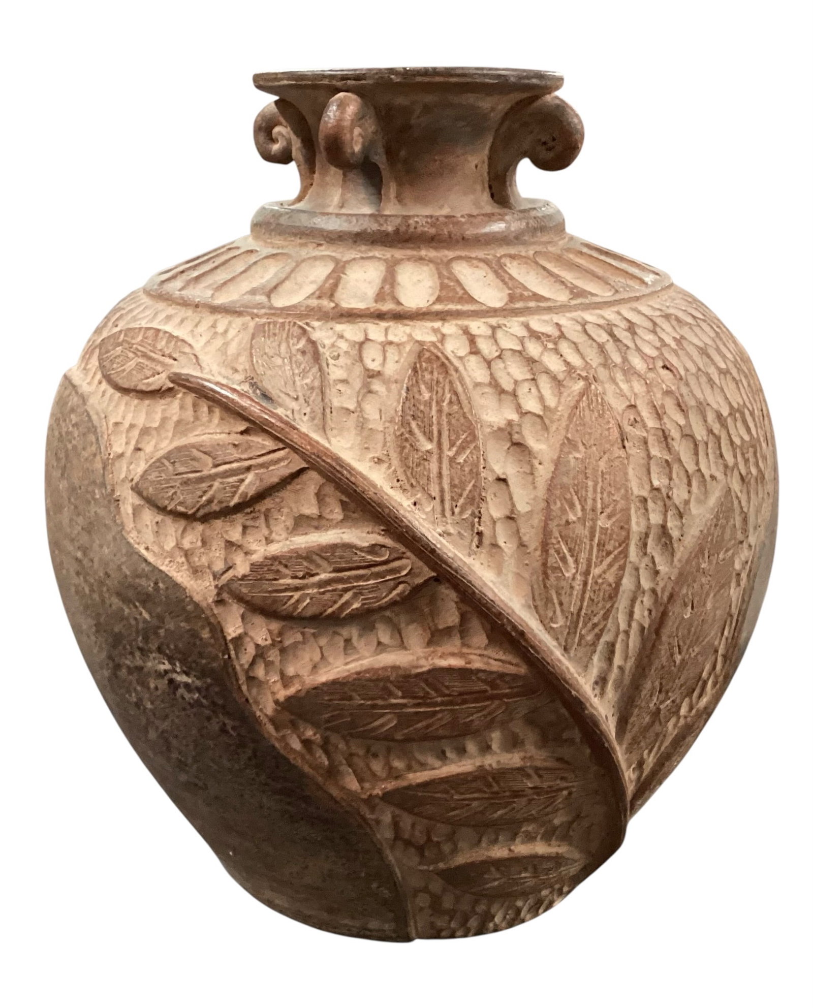 Hand-Carved Tribal Style Earthenware Pottery Vessel: Decorative handcrafted earthenware pottery vessel featuring deeply carved leaf and textured motifs with sculptural scroll-form handles at the neck. Executed in natural clay tones with darkened burnish