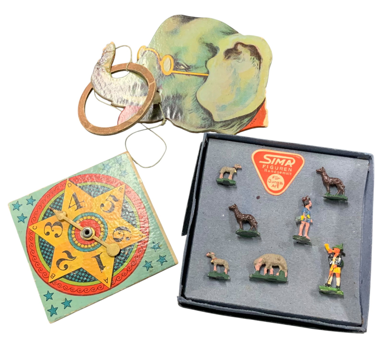SIMA Figures & Vintage Elephant Toy Games: Bid with confidence, we now offer economical in-house shipping! Just select self-arranged shipping during checkout and we will handle packing and shipping for you.Eclectic vintage toy lot featuring a