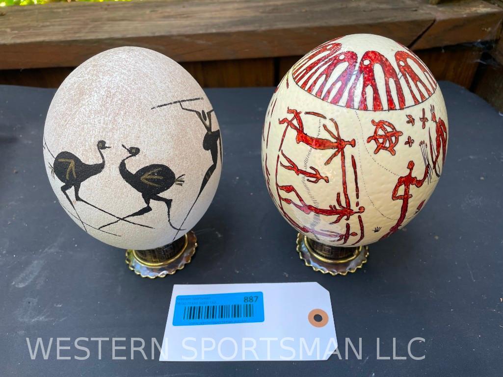 2 painted Ostrich Eggs, - African Hunting & Battle Scenes on display stands 7 1/2 inches tall x 4 1/ (1 of 4)