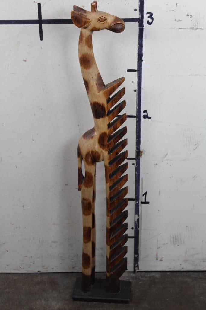Hand Carved GIRAFFE Compact Disc or DVD Rack: Hand carved GIRAFFE Compact Disc or DVD Rack. Could also be used as Decorative African Art. Measures 39.75"Tall x 4.75"Wide x 8"Depth. DECORATIVE AFRICAN ART 