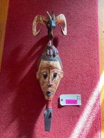 Very Ornate African Mask, Ram head, licking a hand, with a Crocodile head at the bottom