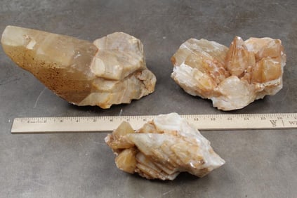 13lbs 4oz of Natural and Raw mostly HONEY CALCITE with some WHITE CALCITE. 3 Specimens