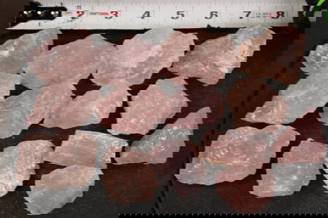 14 Pieces of Natural Raw ROSE QUARTZ (ONE$): 14 Pieces of Natural Raw ROSE QUARTZ. They measure from 1.5" to 2.5" Wide in Diameter each. Total Weight: 1 lb 14 oz. Each Rose Quartz stone is irregular and unpolished. They could be used for tumblin