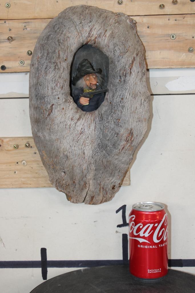 "Knothole" Hand Carved and signed (Branded) Sculpture by artist Gene Zesch: Incredibly detailed hand carved "Knothole" wooden sculpture by famed artist Gene Zesch (b.1932). It is signed "Z" which is branded into the wood. It measures approx. 13.25" Tall x